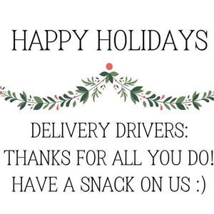 May include: A white card with the text "HAPPY HOLIDAYS" and "DELIVERY DRIVERS: THANKS FOR ALL YOU DO! HAVE A SNACK ON US :)". The text is in a black, elegant font, with a decorative floral design.