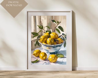 May include: A framed art print of a still life featuring a bowl of lemons. The lemons are yellow and sit in a blue and white bowl. Green leaves and the text "DIGITAL DOWNLOAD" are also visible.