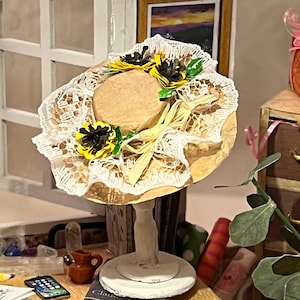 Miniature lady&#39;s garden hat with sunflower