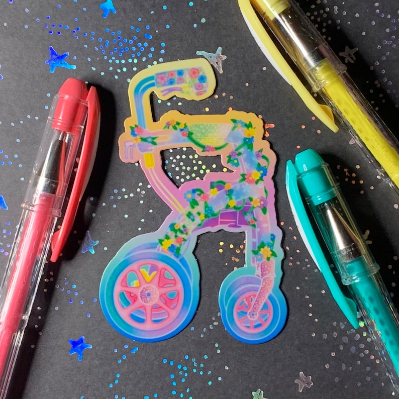 A die-cut sticker of a rolling walker mobility aid. The chair is decorated with flowers and vines.