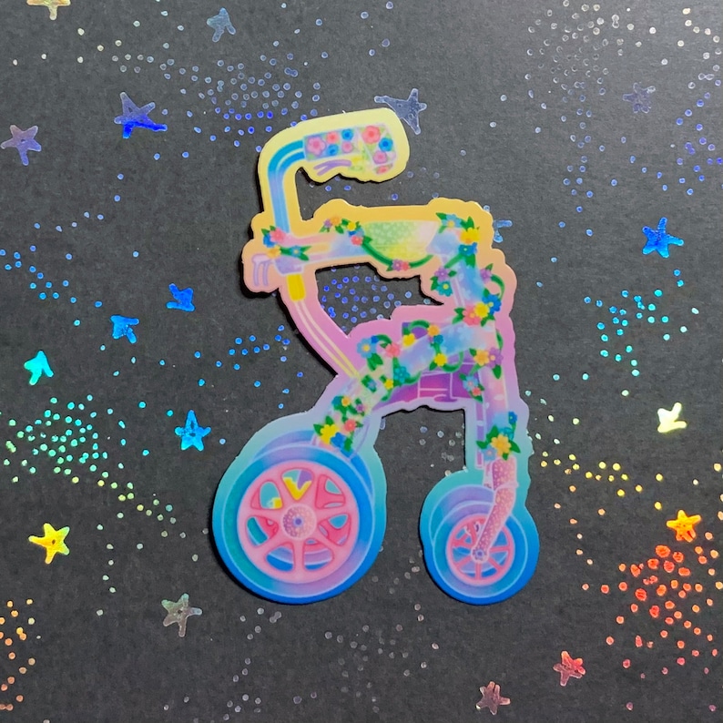 A die-cut sticker of a rolling walker mobility aid. The chair is decorated with flowers and vines.