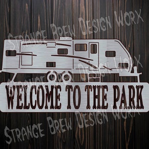 May include: Metal sign with a silhouette of a camper and the text "Welcome to the Park".