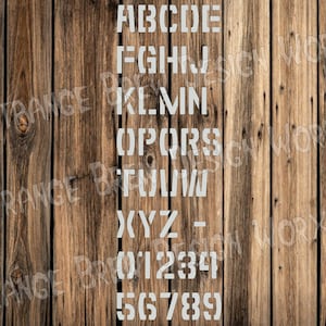 May include: White stencil letters and numbers on a wood background. The letters are A-Z and the numbers are 0-9. The letters are in a block font.