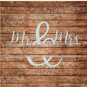 May include: White wooden sign with the words "Mr. & Mrs." in a cursive font. The ampersand is a decorative design.