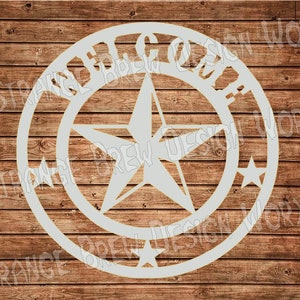 May include: A white metal sign with a five-pointed star in the center and the words "Texas Brew Co." around the star.