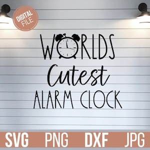 May include: A black and white graphic design with the words "Worlds Cutest Alarm Clock" and an alarm clock illustration. The words "Digital File" are in a circle at the top left. Below are the file types: SVG, PNG, DXF, and JPG.