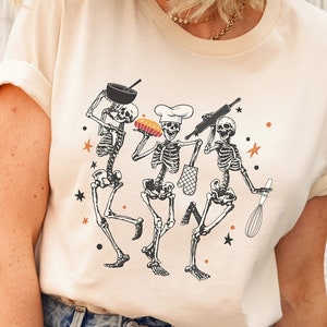 Dancing Skeletons Baking T-Shirt: Funny Halloween Baker Gift