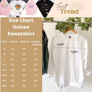 May include: Size chart for a unisex sweatshirt with measurements in inches for width, length, and sleeve length. The chart shows sizes from S to 5XL. A white sweatshirt is shown hanging on a hanger with measurements labeled "width" and "hight".