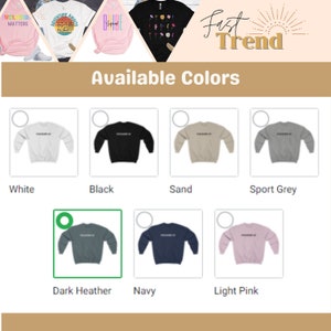May include: A selection of sweatshirts in various colors, including white, black, sand, sport grey, dark heather, navy, and light pink. The sweatshirts are all crew neck and have a relaxed fit.