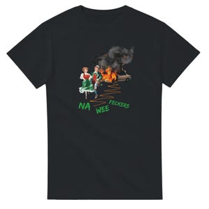 May include: Black t-shirt featuring a vintage-style graphic of two people in traditional clothing running away from a burning car. The text "NA WEE FECKERS" is printed in green below the image.