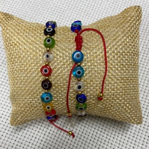 evil eye rainbow beaded bracelet, multicolor evil eye bracelet, adjustable evil eye bracelet, pulsera contra el mal de ojo, proteccion