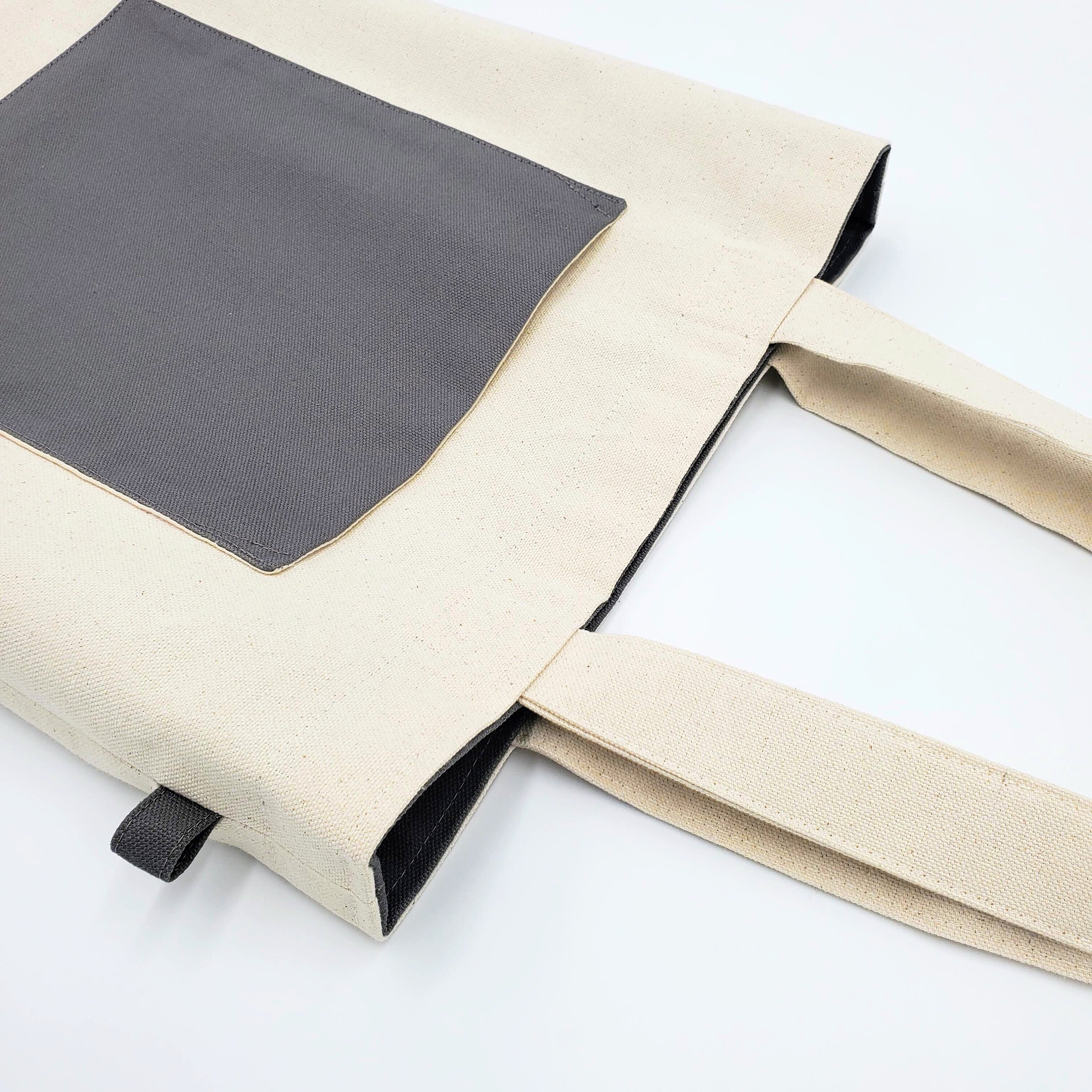 yu⭐︎3FRAMEWORK TAG FABRIC TOTE 2wey 60.png?v=1740778013&width=1080