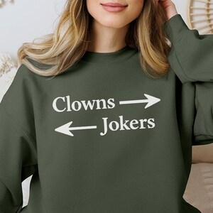 May include: A rustic wooden sign with the text "Welcome to our home" in a handwritten style. The sign is rectangular, with a distressed finish, and features a simple, inviting design. It's suitable for indoor or outdoor use.