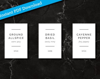 May include: Three white printable labels with black text for spice jars. The labels read "Ground Allspice", "Dried Basil", and "Cayenne Pepper". Each label includes a description of the spice, such as "warm, spicy" or "fiery, peppery".