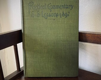 May include: A green book with the title "Practical Commentary S.S. Lessons 1897" on the cover.