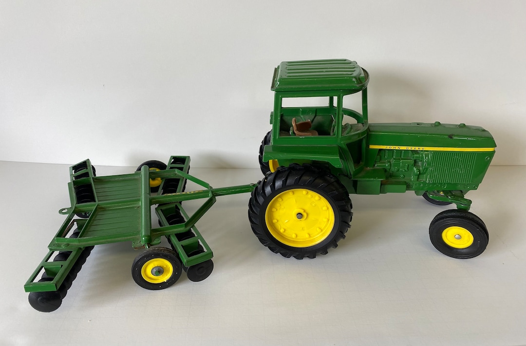RARE FIND Vintage John Deere Tractor Die Cast Metal With Tilling