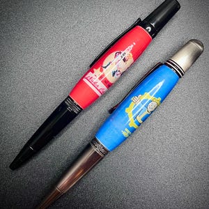 Fallout inspirierte Drehkugelschreiber - Vault Boy & Nuka-Cola