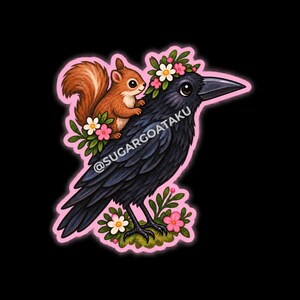 May include: A sticker featuring a black crow with a brown squirrel perched on its back. The crow wears a crown of white and pink flowers, and more flowers surround the base. The text SUGARGOATAKU is printed across the crow's body in white.