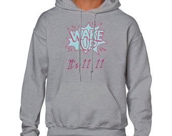May include: A gray hooded sweatshirt with a blue and pink graphic that says "WAKE UP" in a comic book style font. The text "It's 11 11" is written below the graphic.