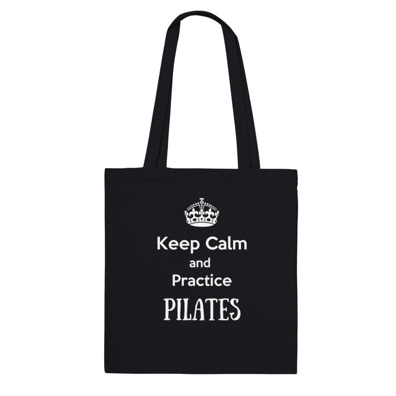 May include: Black tote bag with white text that reads "Keep Calm and Practice PILATES".