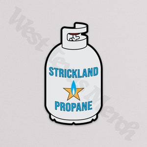 May include: White propane tank with a black outline and a blue star with a yellow flame. The tank has the text "STRICKLAND PROPANE" printed on it.