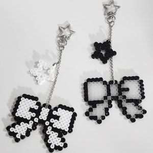 Zawieszka i gwiazdka wykonane z koralików do prasowania z efektem pikselowym