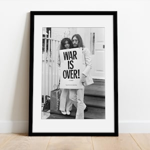 Fine Art photo of John Lennon - John Lennon and Yoko Ono WAR IS OVER - Wood Frame With PassePartout