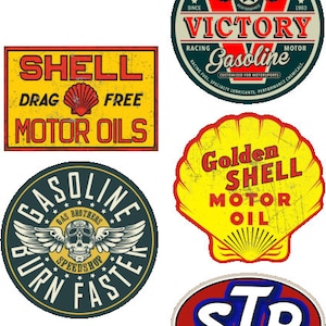 May include: Five vintage-style metal signs with a racing theme. The signs feature the words "Shell Motor Oils", "Victory Gasoline", "Golden Shell Motor Oil", "Gasoline Burn Faster", and "STP The Racers Edge".