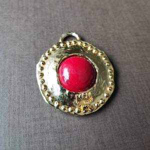 MCM gold tone with red cabochon pendant/key hanger / bag hanger