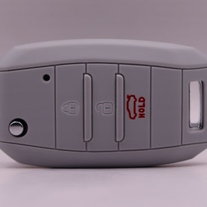 Grey Kia Key Cover: Sportage, Rio, Optima, Sorento, and More