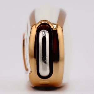 Back of White key cover on Audi key fob.