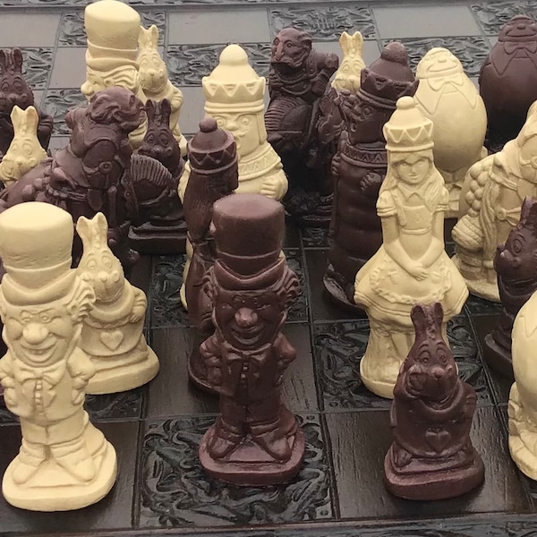 A Stunning Complete UK set Of Alice in wonderland chess set  game pieces-  based on characters in the  Lewis Carroll book and movie