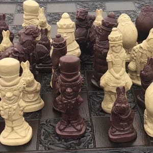 A Stunning Complete UK set Of Alice in wonderland chess set  game pieces-  based on characters in the  Lewis Carroll book and movie