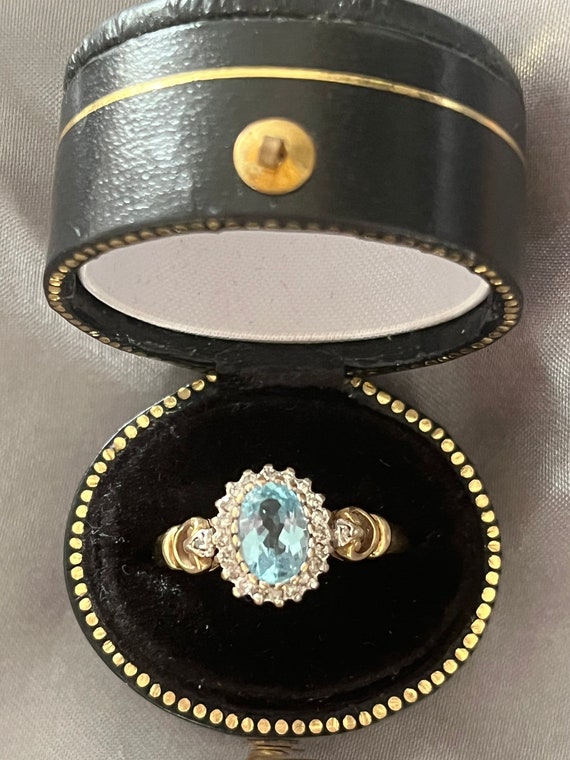 Vintage 9ct yellow gold blue Topaz and Diamond Rin