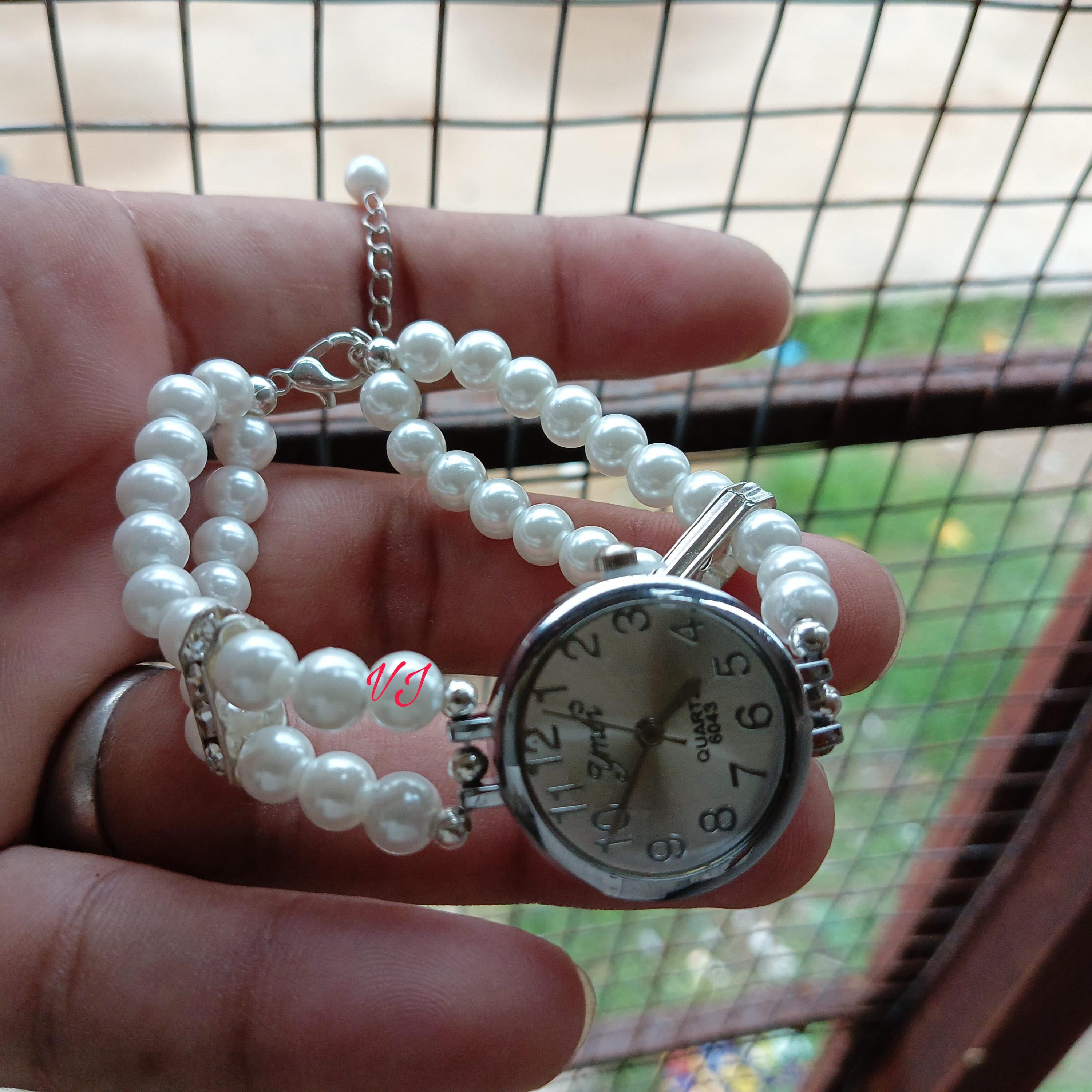 Handmade Beaded Triple Strand Watch with Glass, Shell & Faux Pearls, Silver Tone Amazon.com: Black and white pearl multi strand necklace with  main image 3