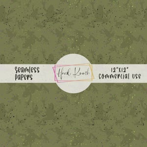 May include: A seamless paper design with a repeating pattern of frog silhouettes in green and black, with scattered speckles. The text "seamless papers" and "12"x12" commercial use" are displayed. The design is by Hard Knock Design.