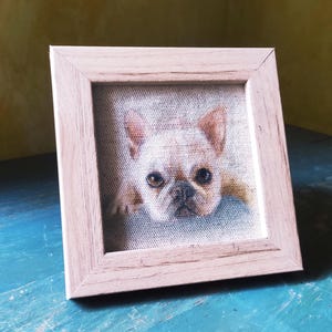 Hand-painted picture featuring a cute French bulldog face. Square frame for freestanding or wall mounting, a gift idea for dog lovers.