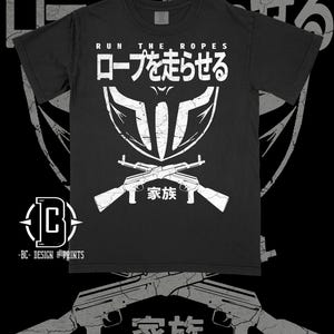 May include: Black t-shirt with a white graphic design featuring a skull with crossed rifles and the text "RUN THE ROPES ロープを走らせる 家族".