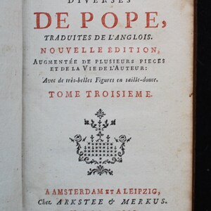 May include: A book cover with the title "OEUVRES DIVERSES DE POPE, TRADUITES DE L'ANGLOIS. NOUVELLE &Eacute;DITION, AUGMENT&Eacute;E DE PLUSIEURS PIECES ET DE LA VIE DE L'AUTEUR: Avec de tr&egrave;s-belles Figures en taille-douce. TOME TROISIEME."  The book was published in Amsterdam and Leipzig in 1763.