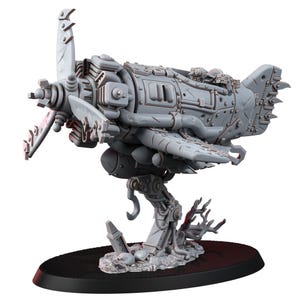 May include: A gray, detailed model of a steampunk-style airplane. The model features a large propeller, riveted panels, and a mechanical undercarriage. It is mounted on a black circular base, showcasing a post-apocalyptic aesthetic.