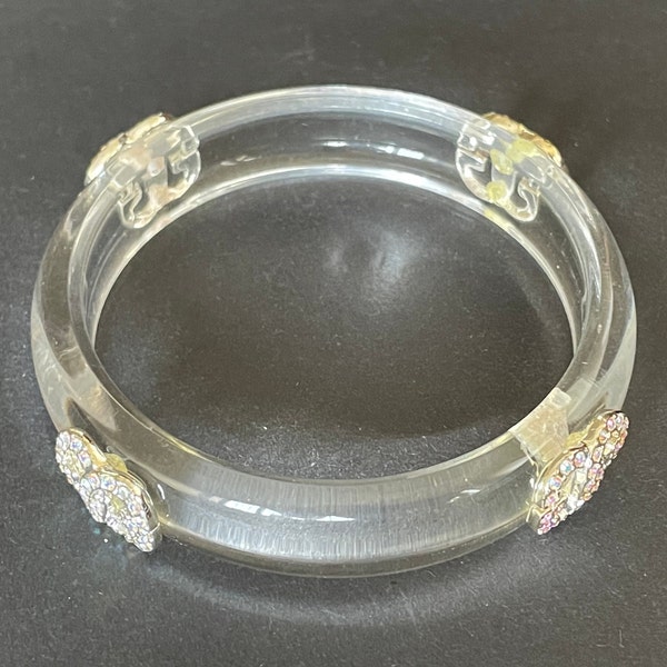 Fantastic pre-owned designer ice clear perspex bangle bracelet with rhinestone logo embellishments - Guess