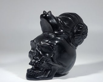 Obsidian Skull with Snail Carving