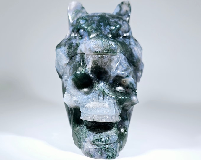 Moss Agate Skull with Wolf Carving