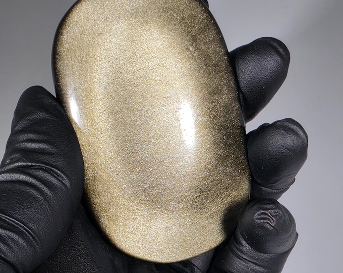 Golden Obsidian Palm Stone