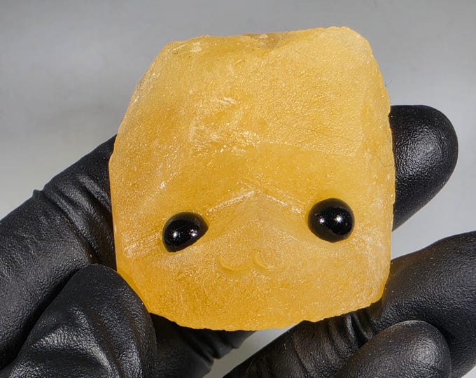 Orange Calcite Pet Rock Carving