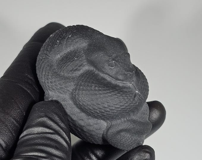 Obsidian Snake Carving