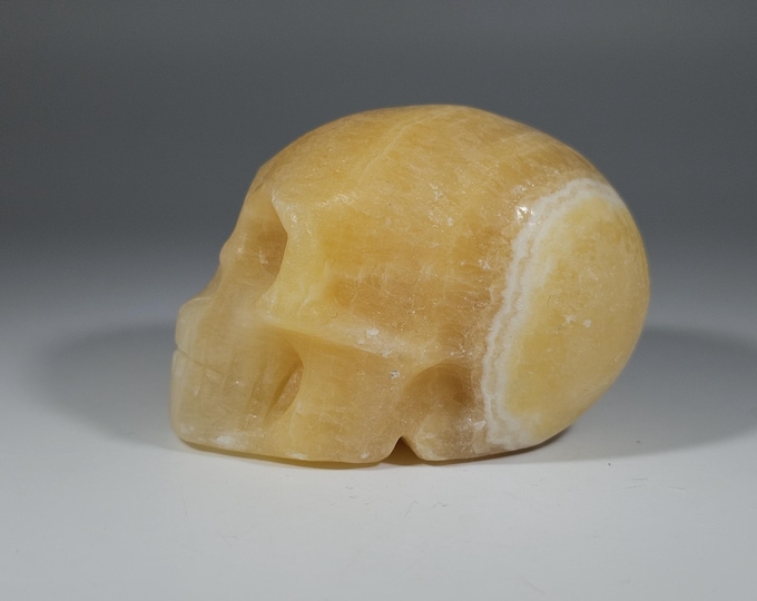 2" Orange Calcite Skull Carving
