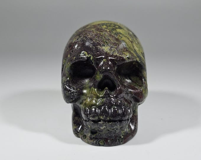 1.99" Dragon Blood Skull Carving