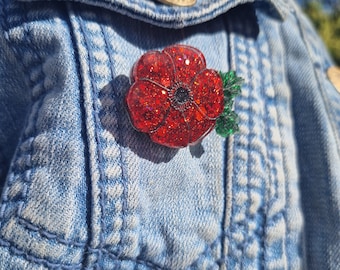 Broche coquelicot en résine scintillante : cadeau du souvenir