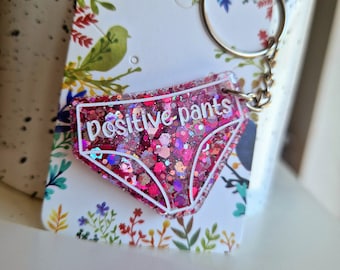 Porte-clés rose positif à paillettes : cadeau pour prendre soin de soi